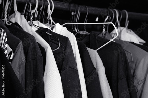 Black and White lot of t-shirt on a hanger 