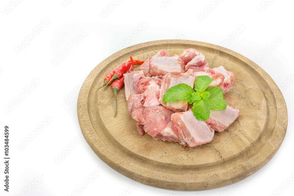 raw pork ribs on cutting board