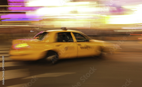 New York Taxi , Yellow cab in Time square fast move