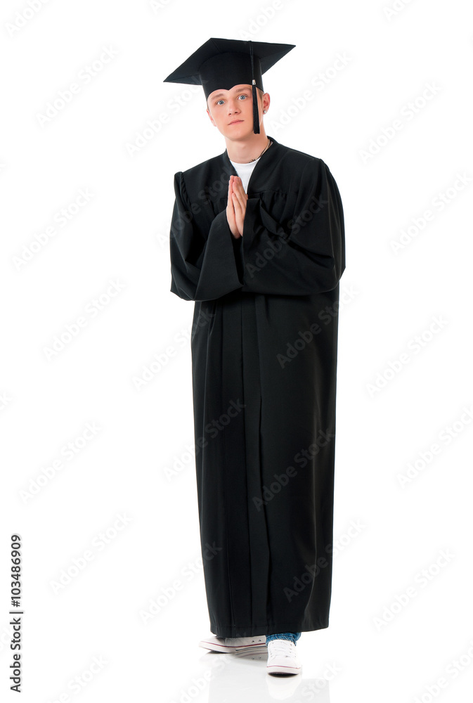 Graduate guy student in mantle - prayer Graduate guy student in mantle - prayer