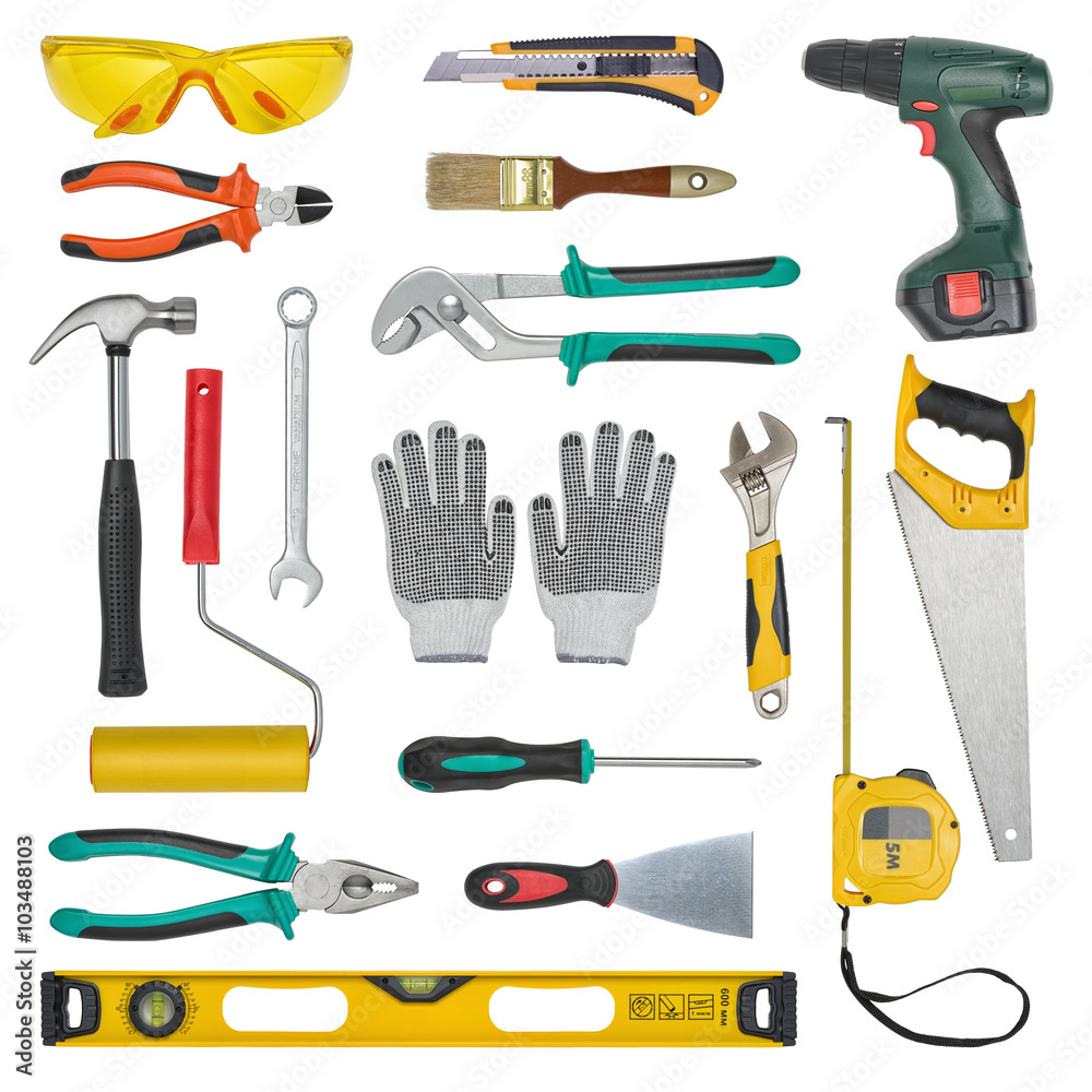 Set of construction tools isolated on a white background. Level, saw, glasses, tape measure, wrench, spanner, paint roll, hammer, cutter, pliers. Set of construction tools isolated on a white background. Level, saw, glasses, tape measure, wrench, spanner, paint roll, hammer, cutter, pliers.