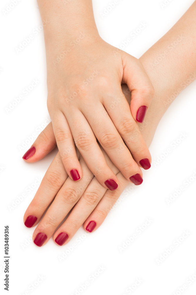 Woman hands with red nail isolated on white Woman hands with red nail isolated on white