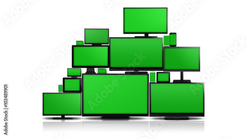 Many different types of screens. TVs, computer monitors, smartphones and tablets. They laid on each other in a pile isolated on a white background. They are all with a green screen.