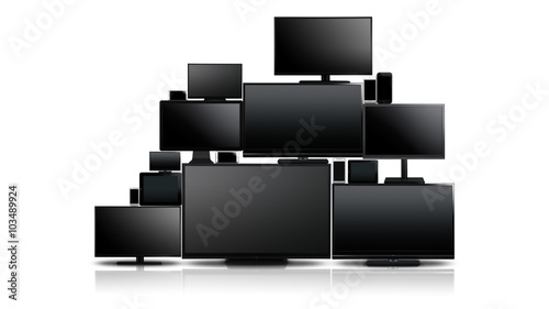 Many different types of screens. TVs, computer monitors, smartphones and tablets. They laid on each other in a pile isolated on a white background. They are all turned off with a black screen.