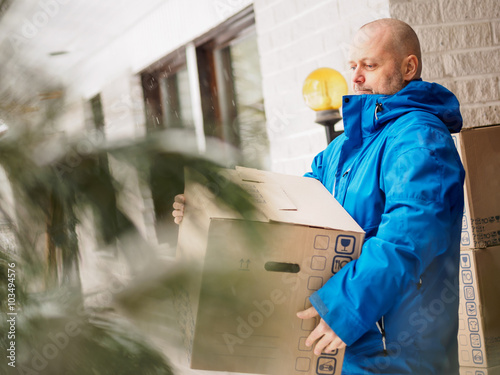Man carrying moving boxes