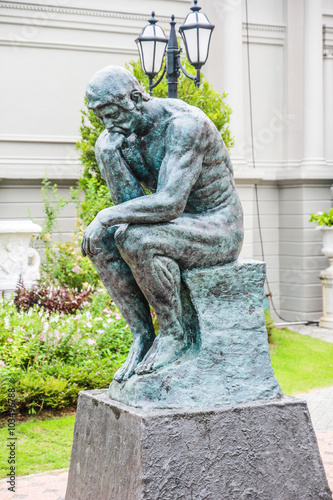 Sad man sculpture in European style