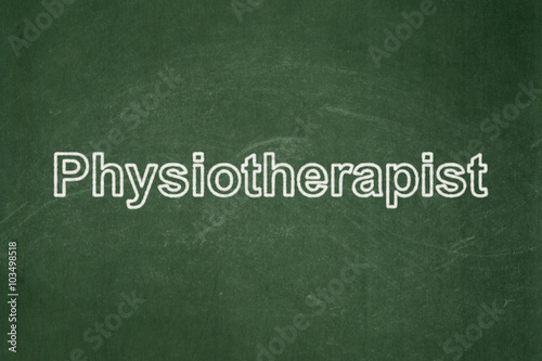 Healthcare concept: Physiotherapist on chalkboard background