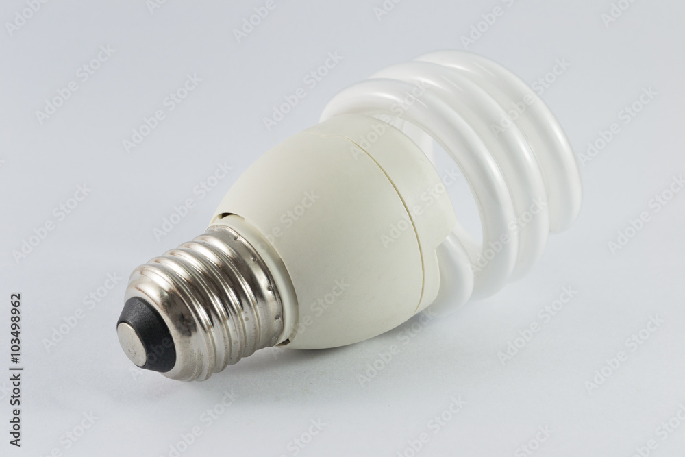 Energy saving fluorescent light bulb on white bakground Energy saving fluorescent light bulb on white bakground