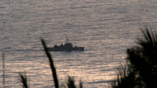 Warship guarding the coast photo