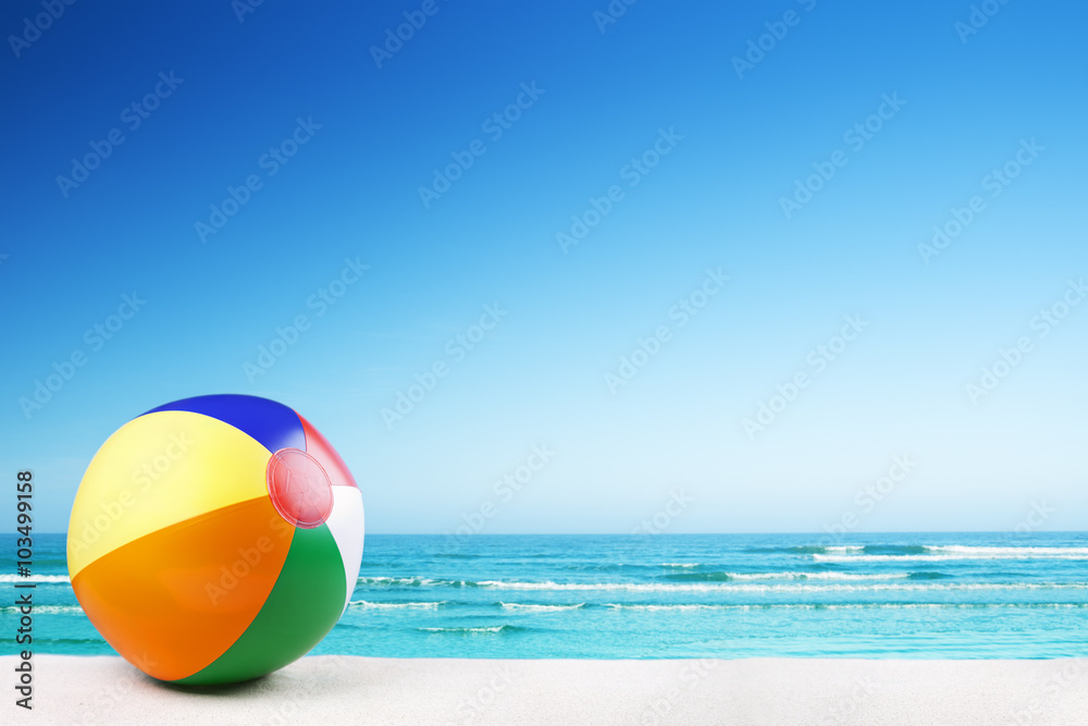 Beach ball on the beach on a clear sunny day