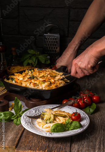Baked pasta with broccoli  cauliflower  cheese and bechamel sauc