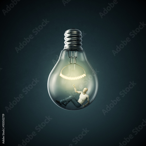 Birth of an idea / 3D render of man inside light bulb