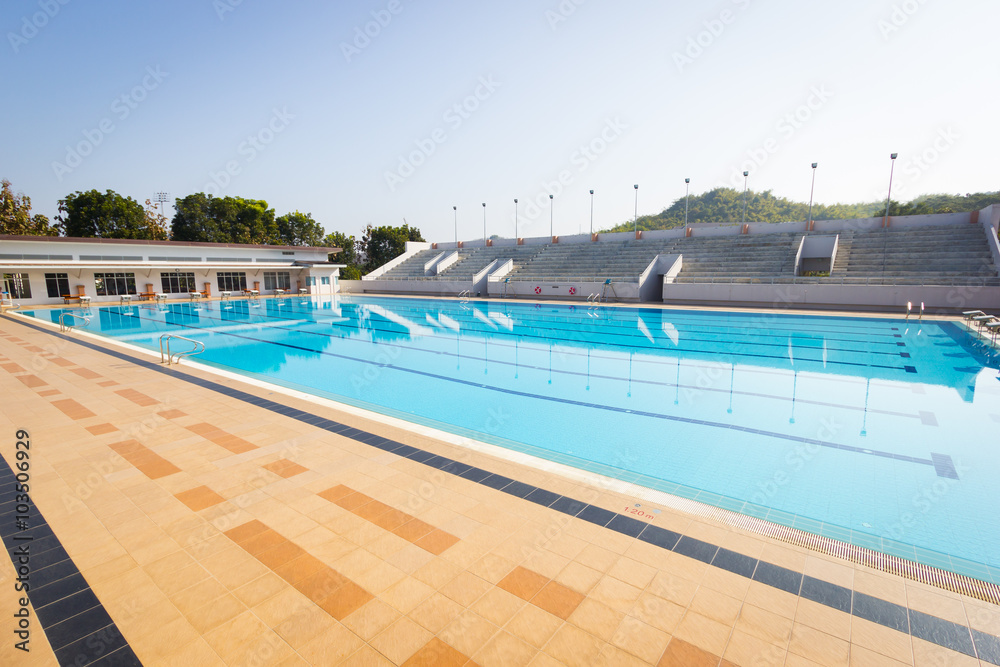 Fototapeta premium empty swimming pool in sunny day, wide shot, horizontal