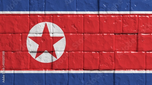 Brick wall with painted flag of North Korea