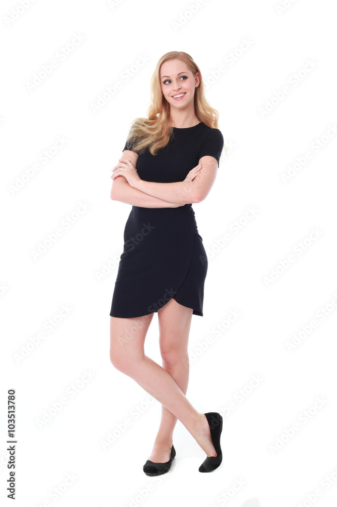 Full length portrait of an attractive professional woman wearing black dress suite and heels, isolated on a white background. Full length portrait of an attractive professional woman wearing black dress suite and heels, isolated on a white background.