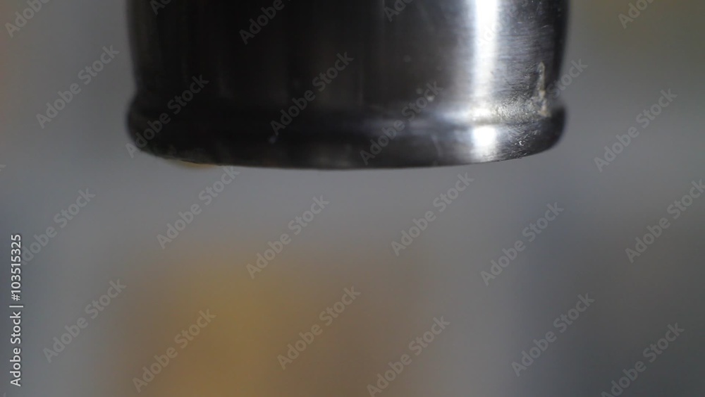 Water dripping from a faucet