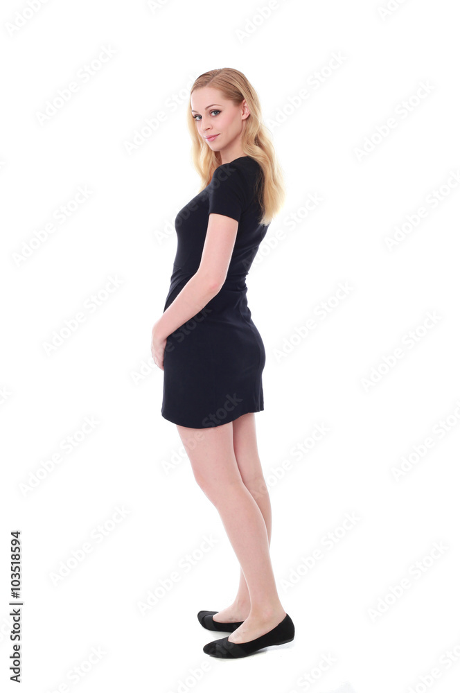 Fototapeta premium Full length portrait of an attractive professional woman wearing black dress suite and heels, isolated on a white background.