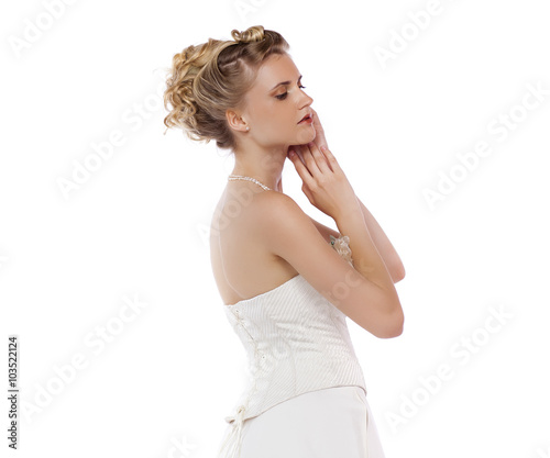 Young beautiful blond woman with a wedding hairstyle