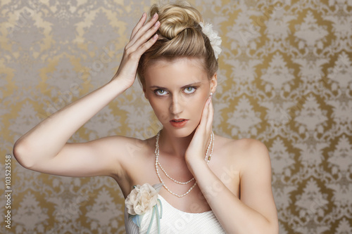 Young bride with beautiful wedding hairstyle