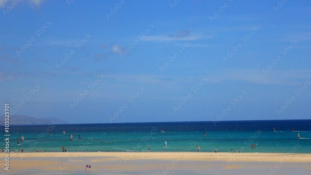 Windsurfer in action on Fuerteventura Canary Islands Windsurfer in action on Fuerteventura Canary Islands