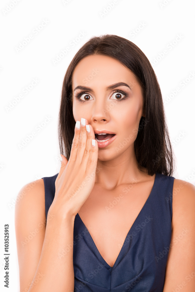 Portrait of surprised shy young woman on white background Portrait of surprised shy young woman on white background