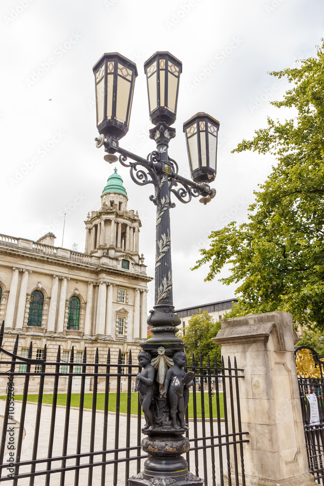 Fototapeta premium Old-fashioned street lamp against the building. Belfast, Northern Ireland