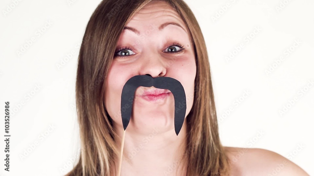 Funny Girl With a Mustache Hamming to the camera.