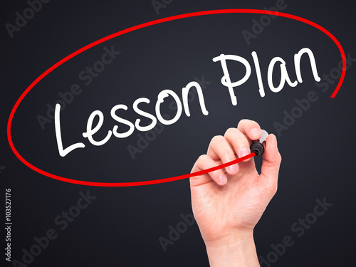 Man Hand writing Lesson Plan with black marker on visual screen