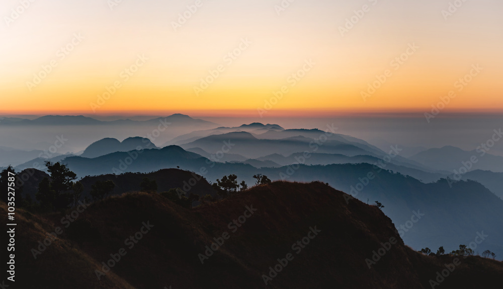 View of  sunset over mountain range, mountain gap, mountain layer