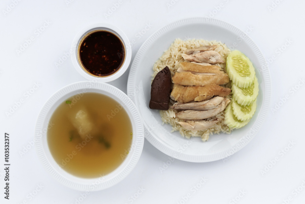Hainanese chicken rice, steamed chicken, chicken blood and white rice on white background.