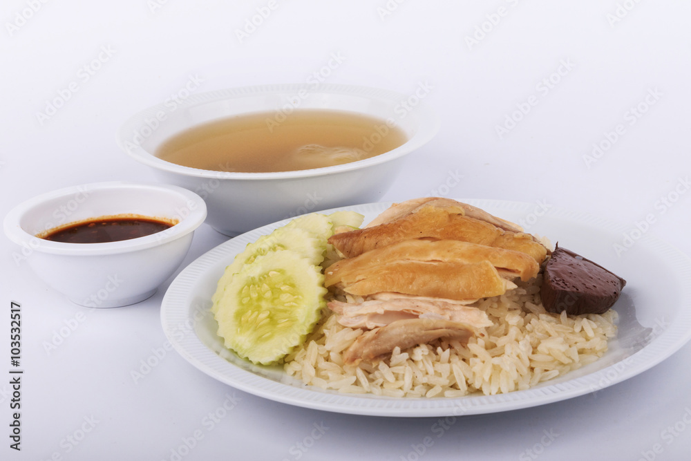 Hainanese chicken rice, steamed chicken, chicken blood and white rice on white background. Hainanese chicken rice, steamed chicken, chicken blood and white rice on white background.