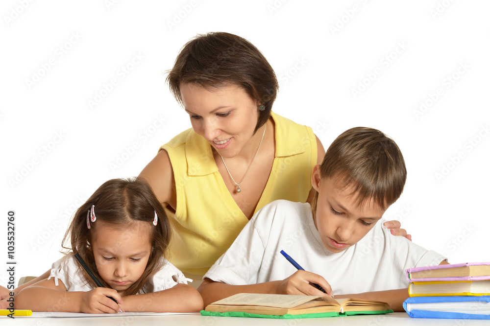 Mother help children do their homework Mother help children do their homework