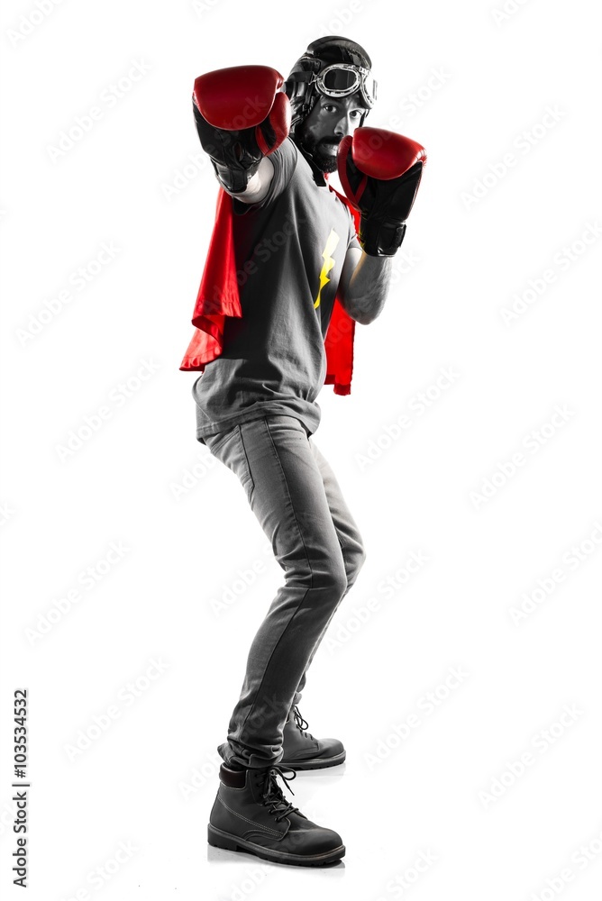 Superhero with boxing gloves making stop sign Superhero with boxing gloves making stop sign