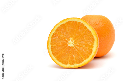 Orange cut in half with a field for the text