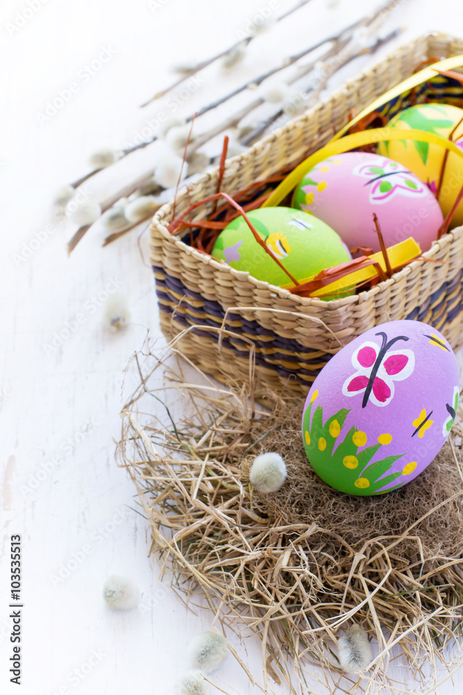 Obraz premium Painted Easter eggs with spring patterns on a white background, 