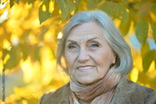 senior woman in autumn park