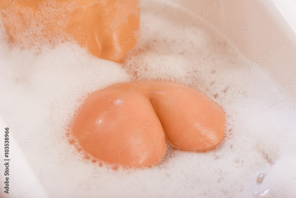 Fototapeta premium Woman taking a bath
