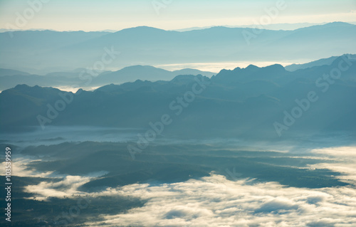 Mountain layer in morning winter fog. © sirins