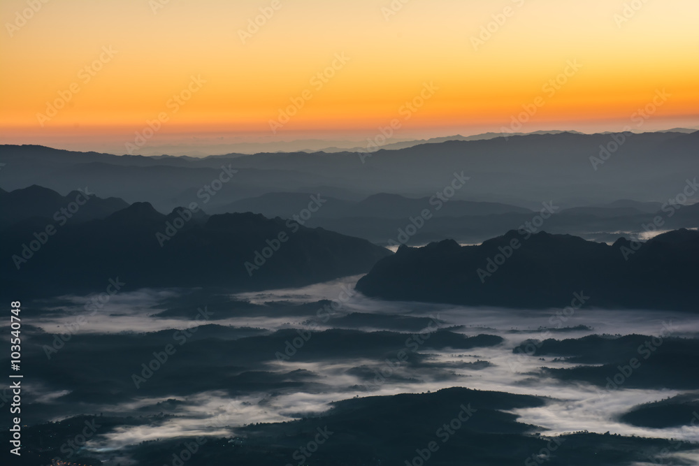 Dramatic sunset and sunrise sky on mountain and fog. Dramatic sunset and sunrise sky on mountain and fog.