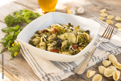 Orecchiette con cime di rapa, Italian pasta with turnip greens photo