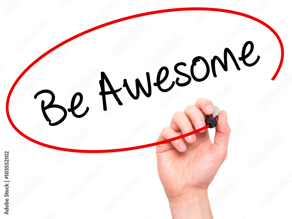 Man Hand writing Be Awesome with black marker on visual screen Man Hand writing Be Awesome with black marker on visual screen