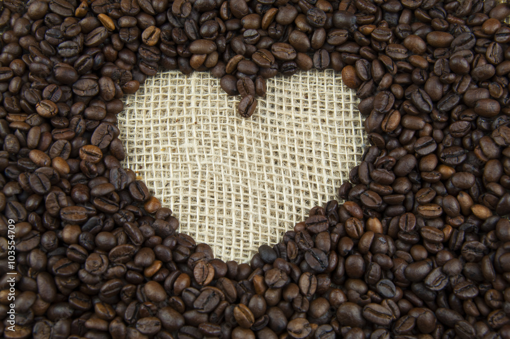 Roasted coffee beans on a linen cloth Roasted coffee beans on a linen cloth