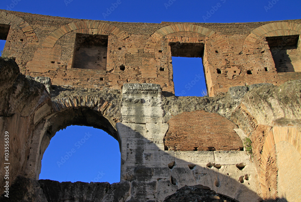 ROME, ITALY - DECEMBER 21, 2012: Inside the Colosseum, also known as the Flavian Amphitheatre in Rome, Italy