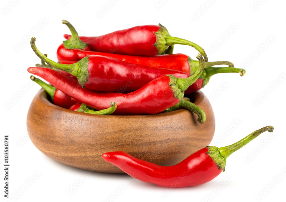 Red hot chili peppers in wooden bowl