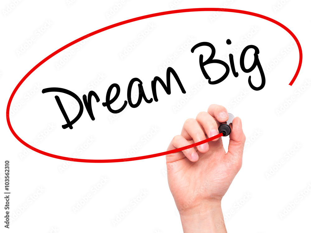 Man Hand writing Dream Big with black marker on visual screen Man Hand writing Dream Big with black marker on visual screen