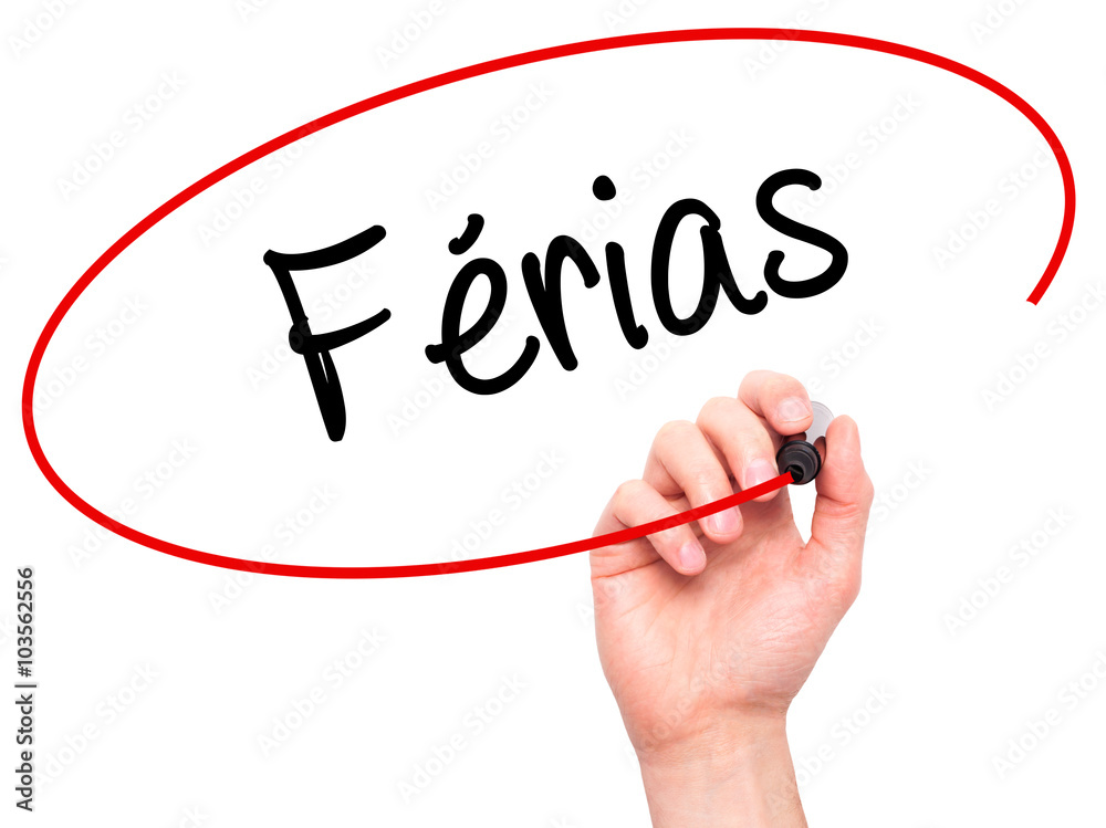 Man Hand writing FĂ?rias (Holidays In Portuguese) with black Man Hand writing FĂ?rias (Holidays In Portuguese) with black