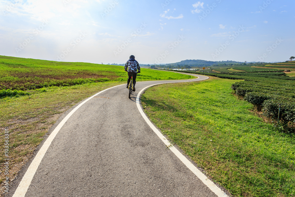 Man cycling outdoor exercise bike paths in Chiang Rai