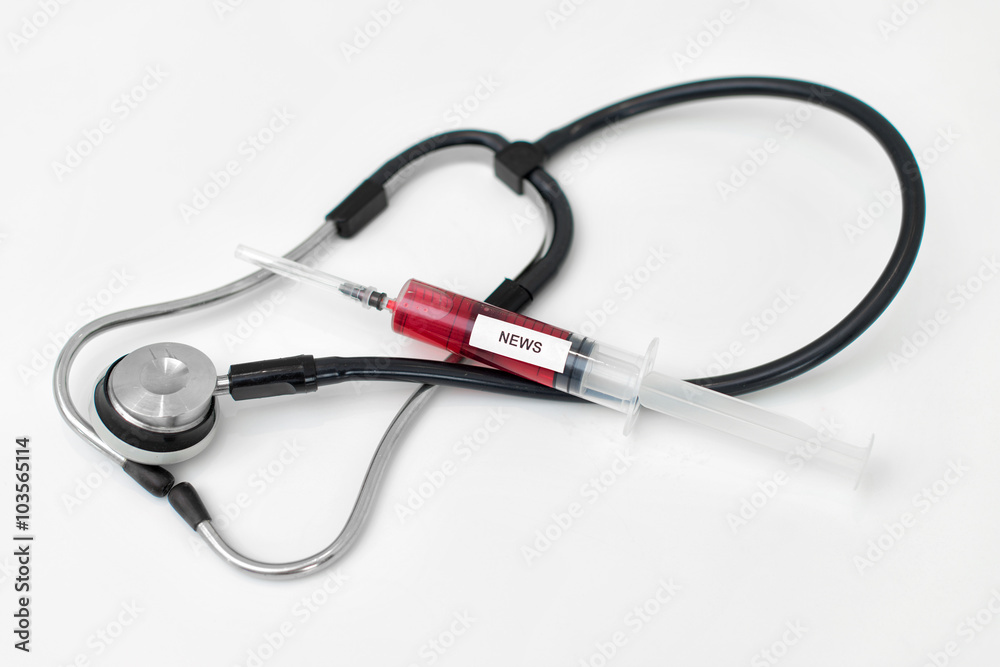 Syringe with red liquid. News addiction concept. Syringe with red liquid. News addiction concept.