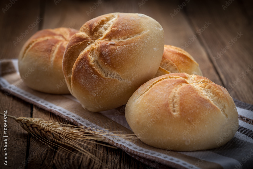 Several kaiser rolls.