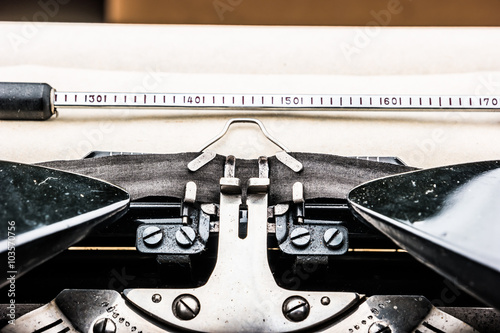 Old typewriter on table.